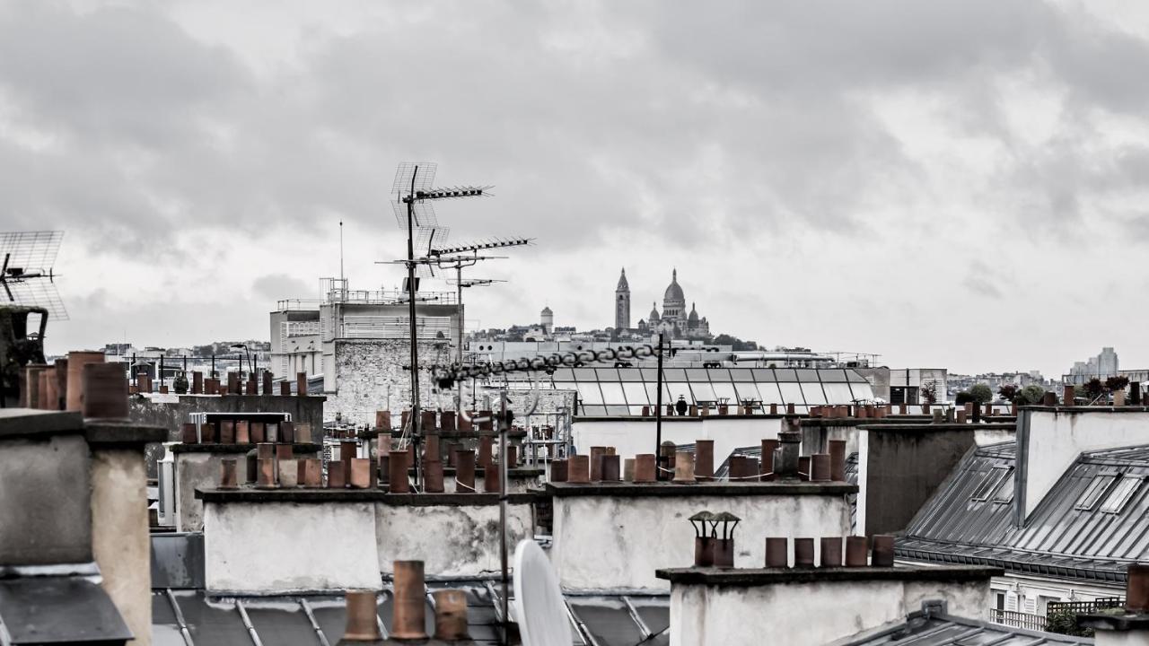 Monsieur George Hotel & Spa - Champs-Elysees Paris Eksteriør bilde View of Paris rooftops